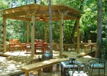 arbor-pergola-with-decking-surrounding-and-several-sitting-areas