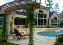 arbor-with-roman-columns-swimming-pool-and-landscape