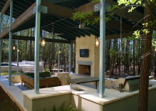 industrial-patio-cover-with-outdoor-kicthen-and-fire-place